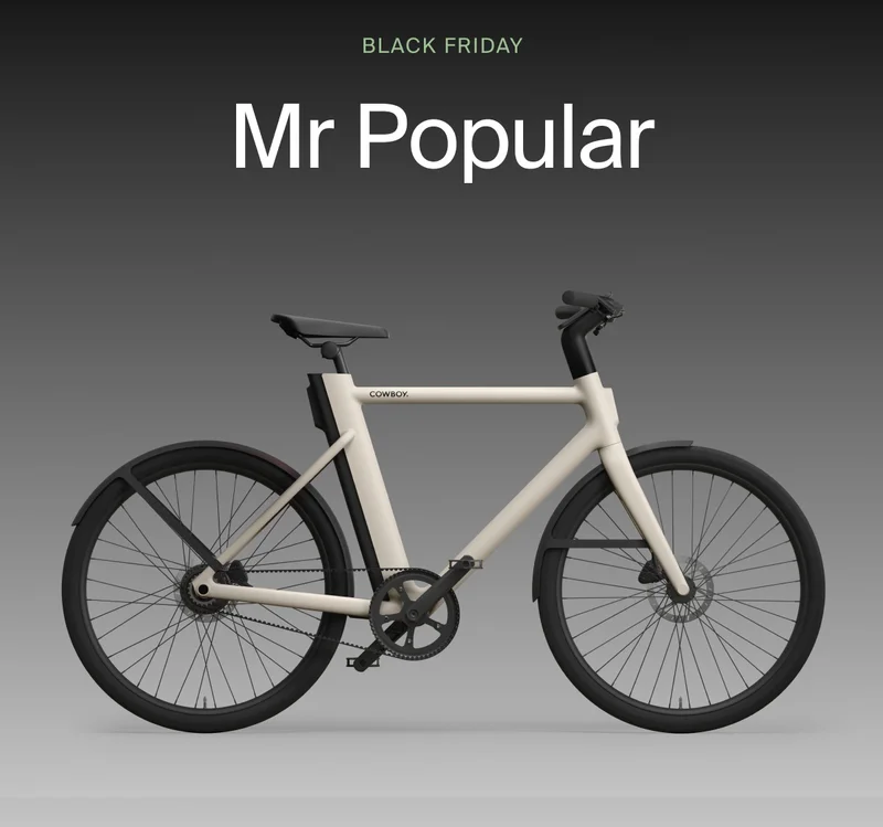 A graphic. Black Friday Cowboy promotion with a rendered e-bike offering €1000 off. Available on top-spec models.