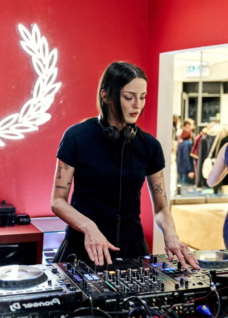 Sim0ne DJing at the Fred Perry Soho Shop Event