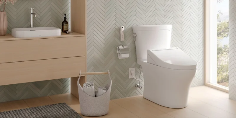 A TOTO Aquia IV Arc WASHLET+ C5 bidet toilet in a modern bright bathroom
