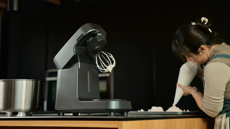 A lady baking using Ooni Halo Pro.