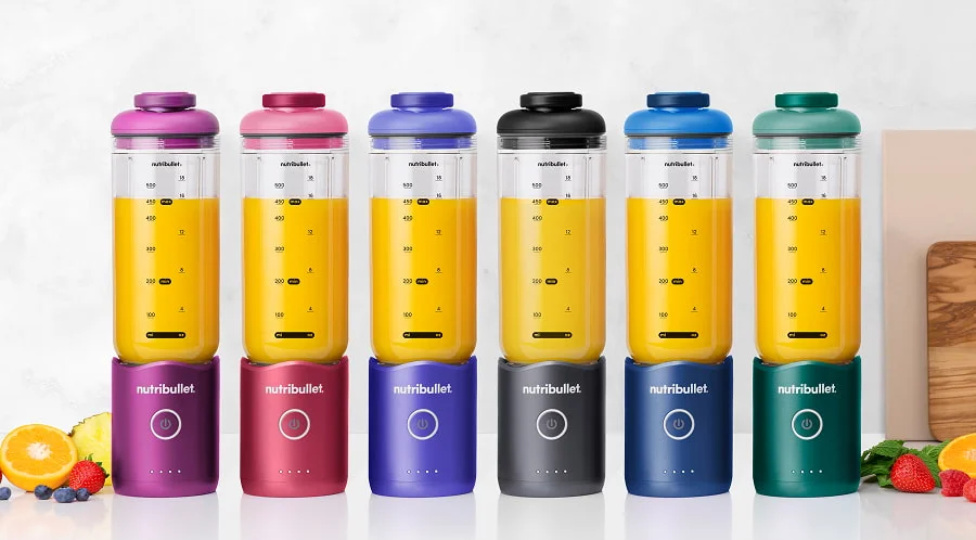 Blenders displayed in orchid, ruby, violet, gunmetal, sapphire, and forest.