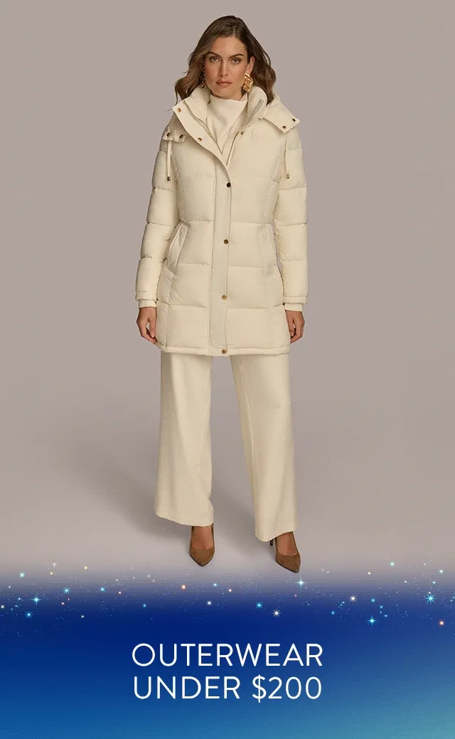 A woman wearing a white puffer coat. A woman wearing a black puffer coat.