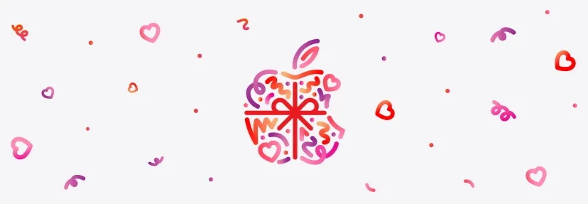 Hearts in pink and red colors pulsate around Apple logo, wrapped in a red color bow, made up of dots, squiggles, and hearts in different hues of red, pink, and purple, surrounded by dots and squiggles in red, pink, and purple colors