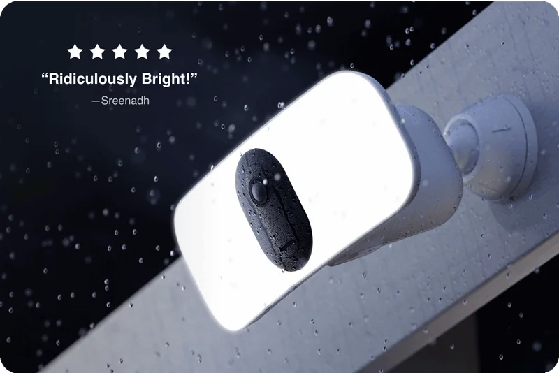 5 stars. Ridiculously bright! Review by Sreenadh. Image of Pro 3 Wireless Floodlight turned on at night in the rain.