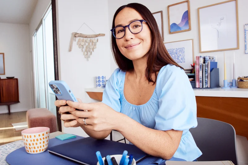 Woman using her iPhone