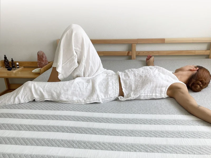 Woman laying on Leesa mattress