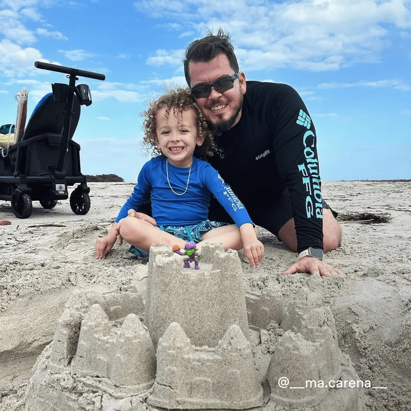 dad and son on beach