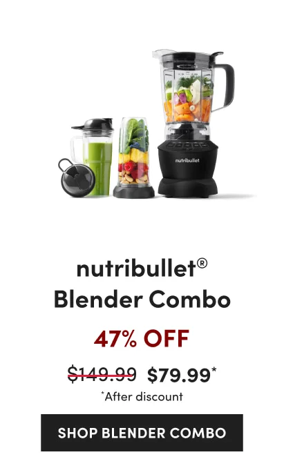 A black nutribullet blender filled with assorted vegetables next to two smaller cups.