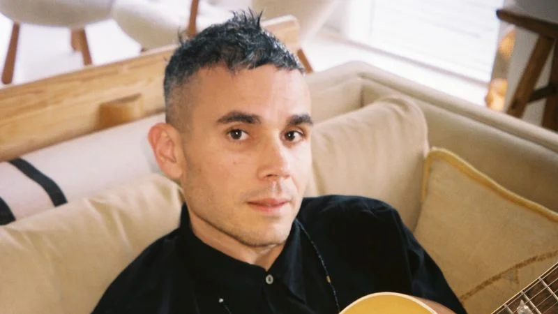Image may contain: Rostam Batmanglij, Adult, Person, Guitar, Musical Instrument, Guitarist, Leisure Activities, and Music