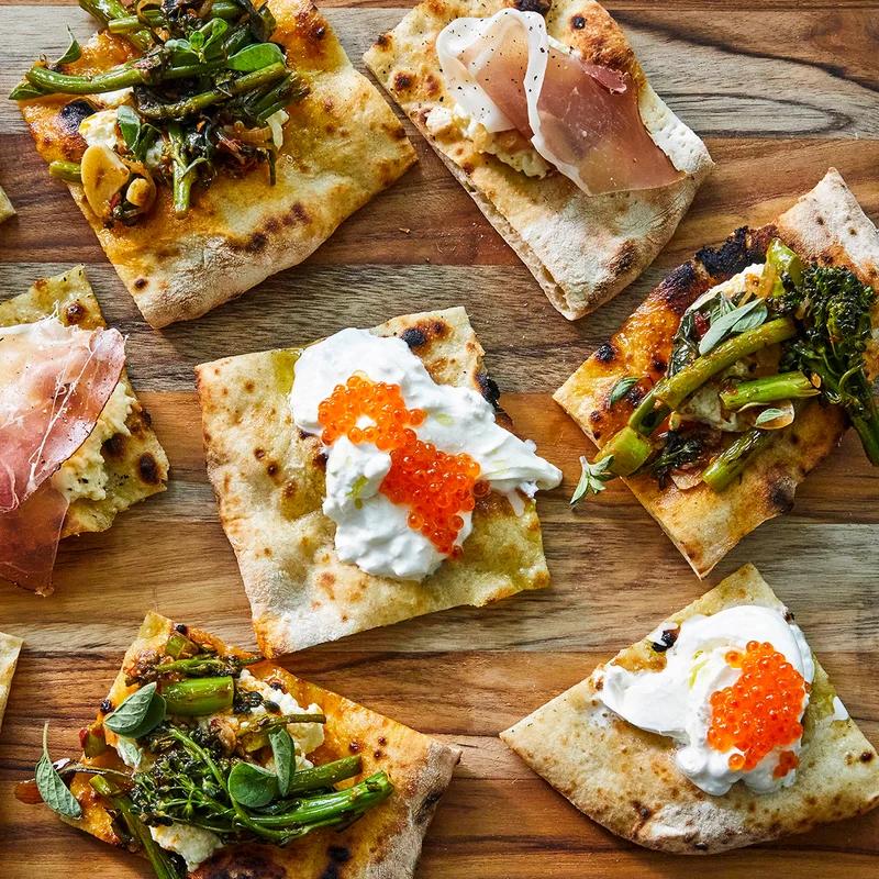 Pizza Crostini with Ricotta and Marinated Broccolini