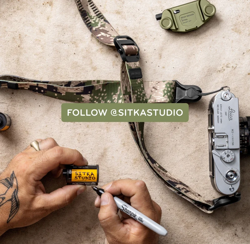 The Sitka x Peak Design Slide Lite camera strap, clickable to Sitka Studio's Instagram.
