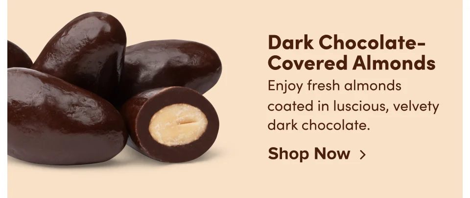Dark Chocolate-Covered Almonds: Enjoy fresh almonds coated in luscious, velvety dark chocolate; Shop now