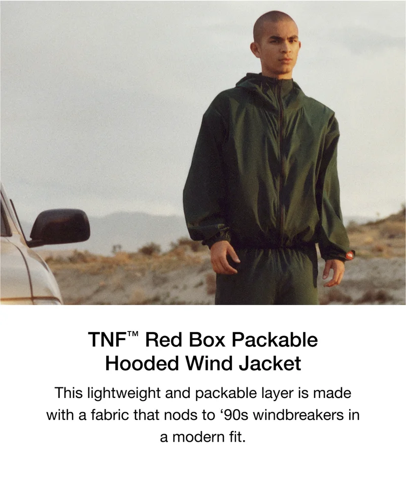 Red Box Packable Hooded Wind Jacket. This lightweight and packable layer is made with a fabric that nods to '90s windbreakers in a modern fit.