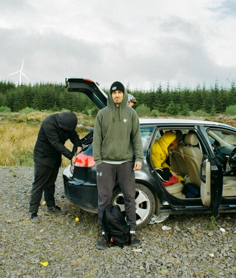 Picture of friends loading up a car after a festival