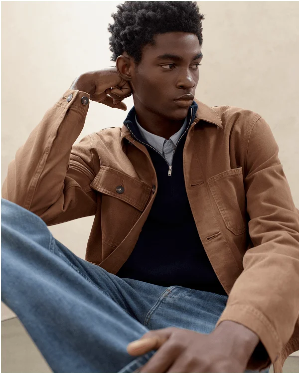 Image |  Model in The Slim Oxford Shirt, The Cashmere Quarter Zip Sweater, Denim Chore Jacket and The Selvedge Straight-Fit Jean