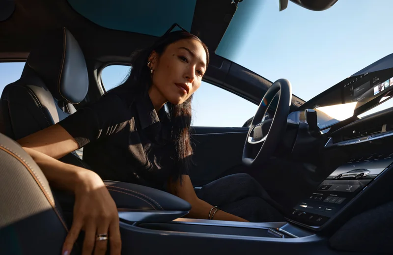Woman in the front seat of a Lucid Air