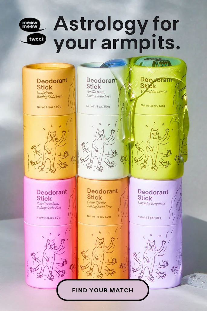 A collection of rainbow colored deodorant sticks stacked