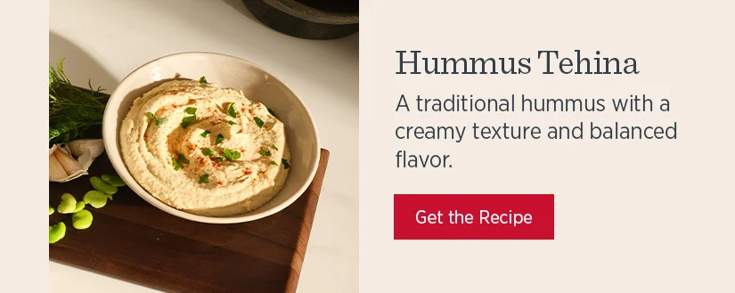 Hummus Tehina - A traditional hummus with a creamy texture and balanced flavor.