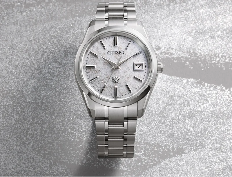 The Citizen watch features a white Tosa&nbsp;washi&nbsp;dial lavishly sprinkled with platinum flakes. A lightweight and scratch resistant Super Titanium™ case and bracelet