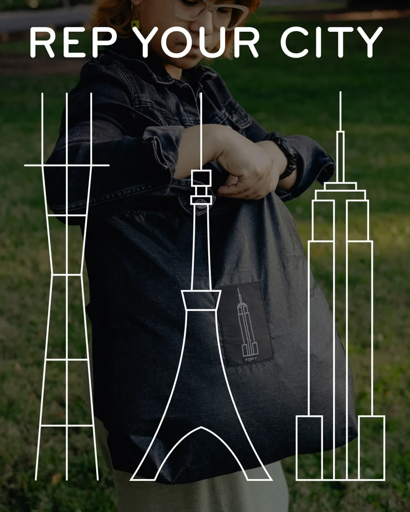 Our PD Retail Store logos over an image of a model using the PDNY Packable Tote.