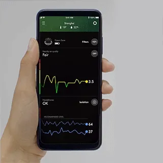 Smartphone shows the MyDyson app displaying air quality information in real-time