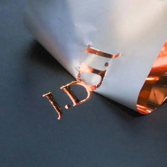 Foil initials debossed onto a presentation case