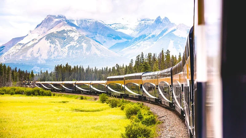 Image description: Scenic mountain views from the Rocky Mountaineer, in Canada.