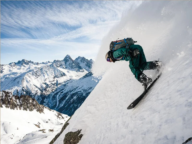 A person snowboarding down a mountain.