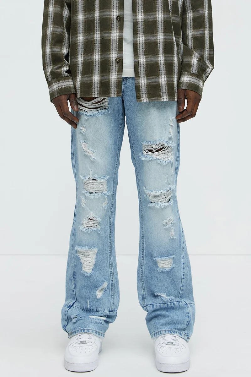 Image of Might Go Ripped Stacked Slim Flare Jeans - Light Wash