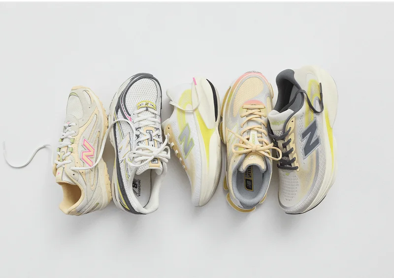Line up of New Balance athletic shoes.