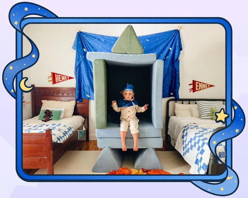 Image of a kid in a Nugget build with a Sarah's Silks crown