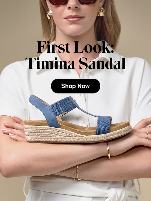 A woman in sunglasses, gold earrings, and a white polo balancing the Timina Wedge Sandal in Blue Breeze atop crossed arms. The email says First Look: Timina Sandal