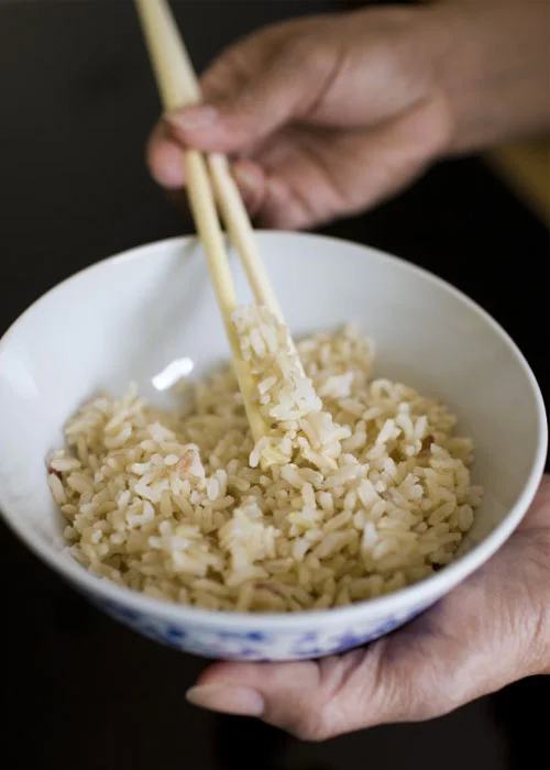 Resistant starch is a type of carbohydrate that is able to pass through your stomach and small intestines, where it will eventually be fermented in the large intestines to benefit your intestinal flora. Whole grain foods, such as brown rice, are a good source of resistant starch.