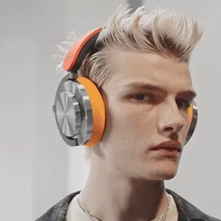 A model wearing Dyson OnTrac headphones.
