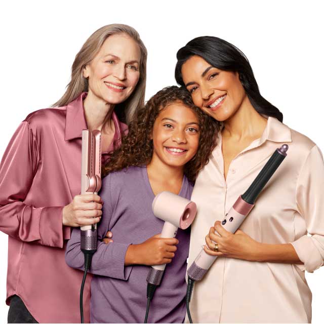 The Dyson hair care range in Ceramic pink and rose gold.