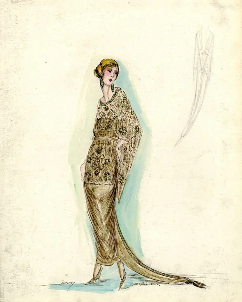 Gold strapless dress; straight skirt, ankle length with train; sheer gold blouse, hip length with round neck, gold and teal floral design on blouse