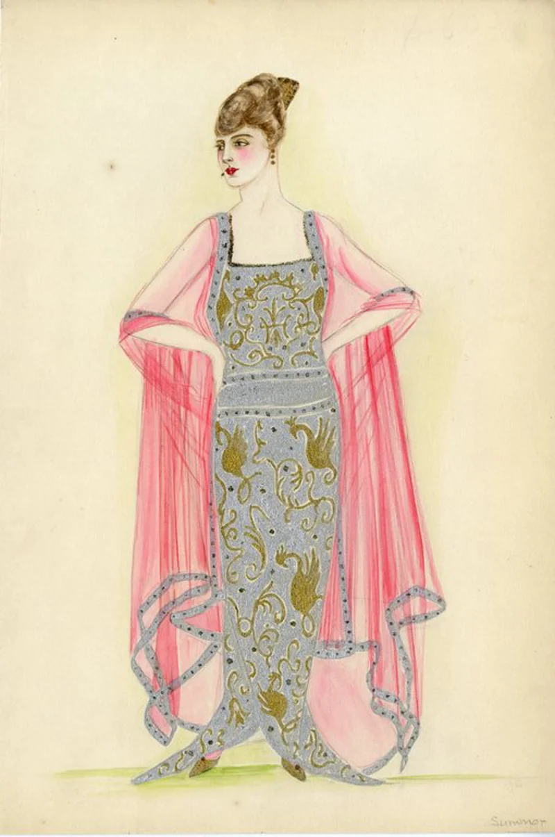 Long silver metallic dress; square neckline; sleeveless; dress fabric with design of gold metallic phoenix and scrollwork; sheer red shawl edged in sliver metallic