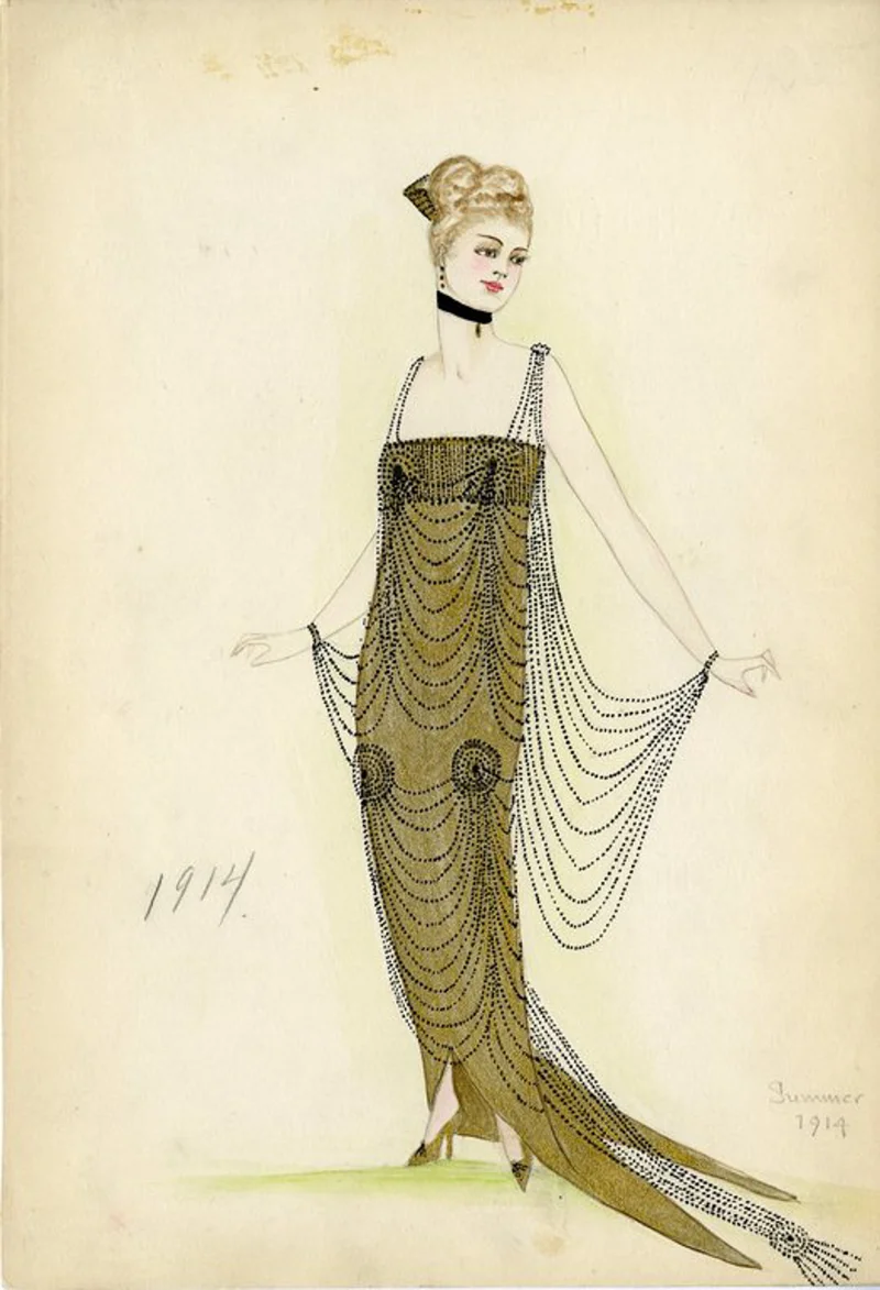 Long gold strapless dress with train; rows of black beads form swags and straps for dress