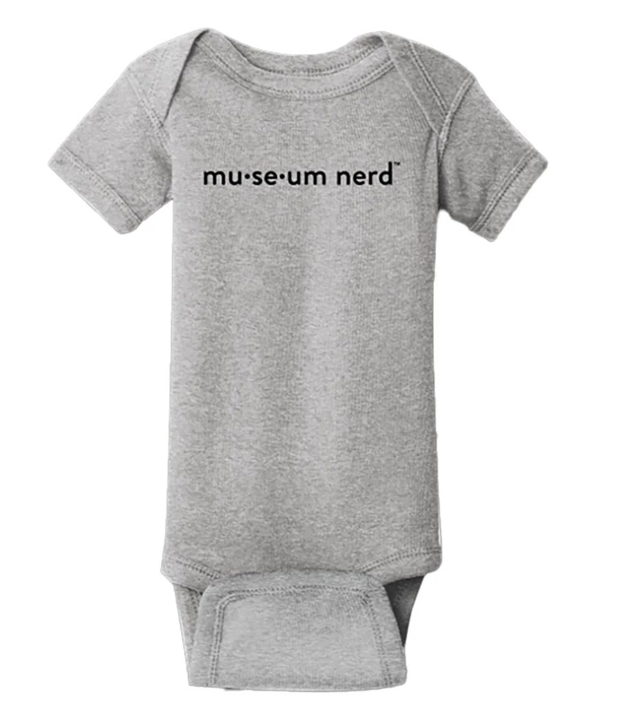 A gray onesie reading "Museum nerd"