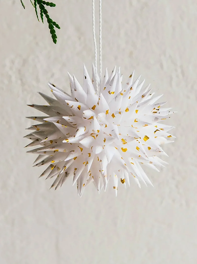 A white ornament made of tissue paper