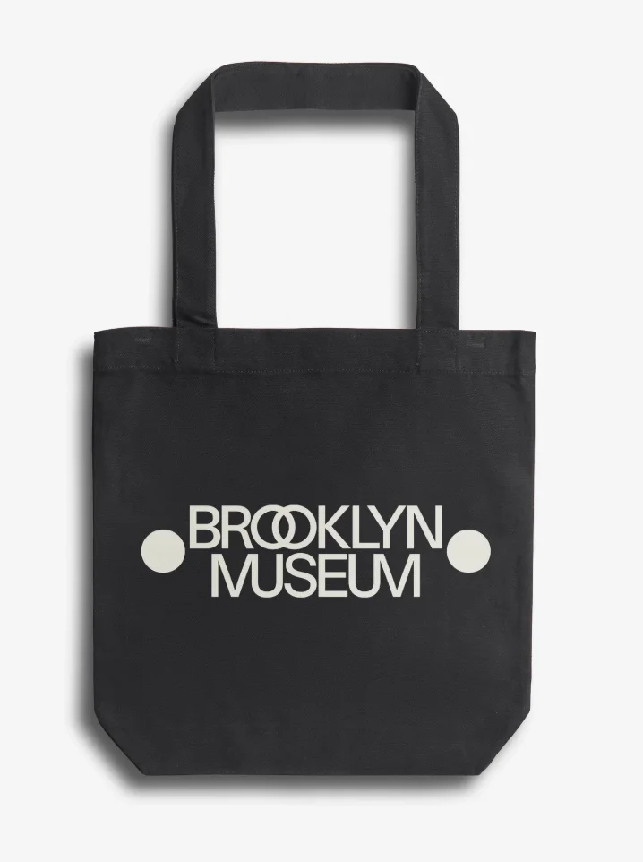 A black tote bag that reads "Brooklyn Museum"