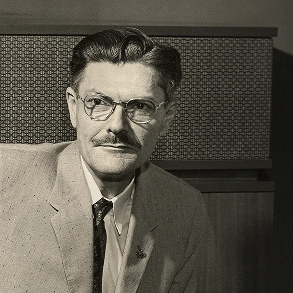 Vintage image of Paul W. Klipsch in front of original Klipschorn