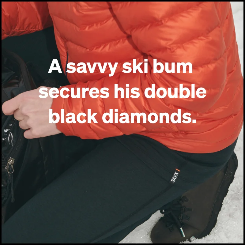 A savvy ski bum secures his double black diamonds.