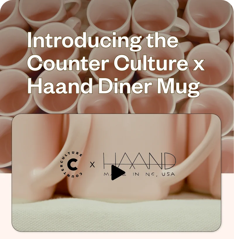 Introducing the Counter Culture x Haand Diner Mug *video* We are over the moon about the chance to collaborate with our NC neighbors and friends at Haand Ceramics in Burlington. We have long admired their stunning, slip cast ceramics and thoughtful approach to their craft and business. We worked together to bring you this exclusive color of their classic diner mug. It's the perfect pink and a pleasing pair for this year's Iridescent box. We hope you love it as much as we do! Introducing the Counter Culture x Haand Diner Mug *video* We are over the moon about the chance to collaborate with our NC neighbors and friends at Haand Ceramics in Burlington. We have long admired their stunning, slip cast ceramics and thoughtful approach to their craft and business. We worked together to bring you this exclusive color of their classic diner mug. It's the perfect pink and a pleasing pair for this year's Iridescent box. We hope you love it as much as we do!