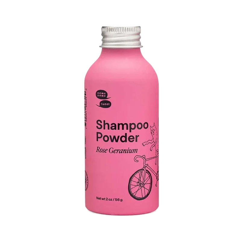 A pink bottle with black text