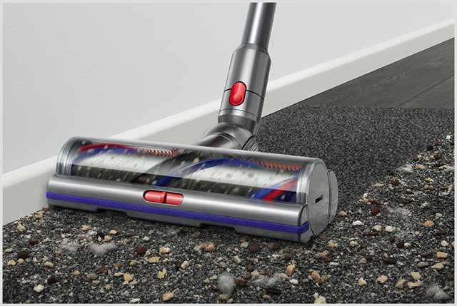 The Digital Motorbar cleaner head moving over dust