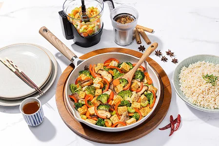 Tofu stir fry with vegetables seasoned with chinese five spice