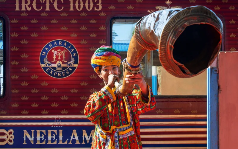 Folk musicians greet passengers boarding the Maharajas’ Express in Jaipur with traditional music.