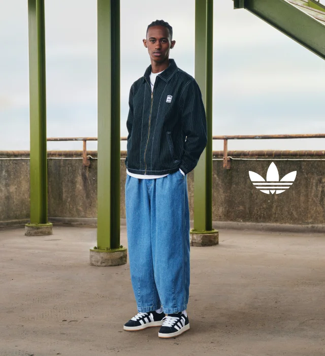 Model wearing adidas Campus sneakers