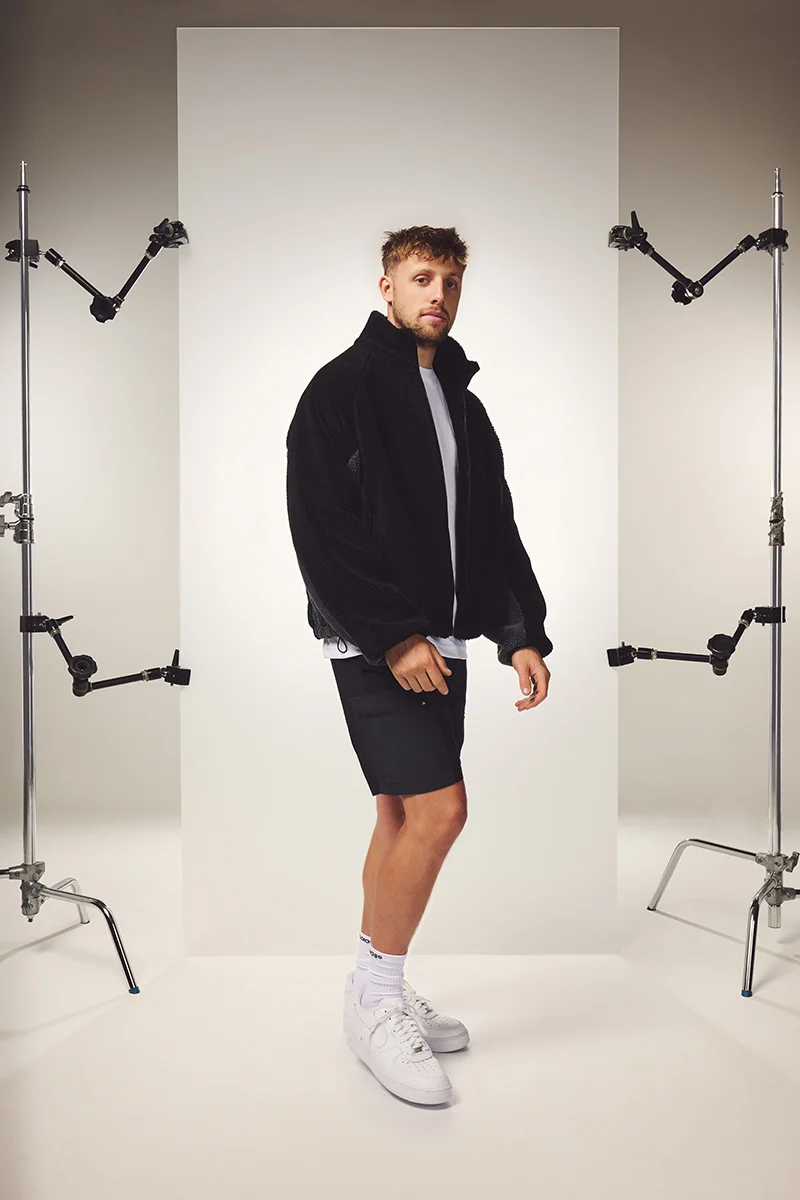 Harry linking to the Studios Fleece in Black